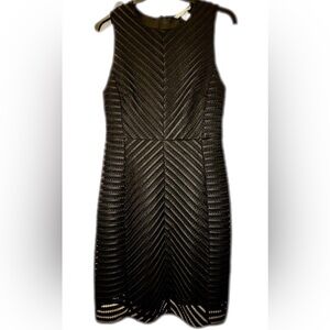 H&M luxe sleeveless black dress. Never worn. Size 10 Fancy Evening